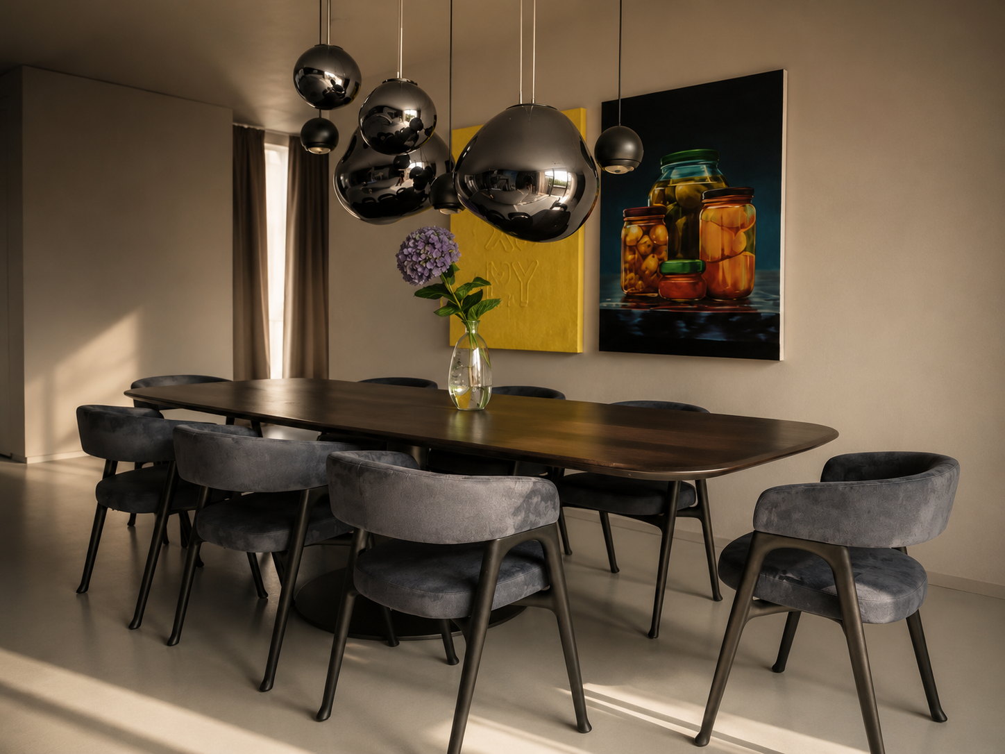 Penthouse dining room in Prenzlauer Berg with a Baxter table and chairs under sculptural pendants